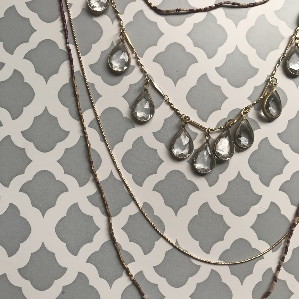 Gold and purple multi string long necklace